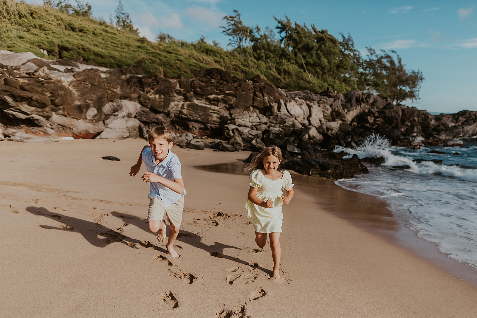 Kids running on the sand