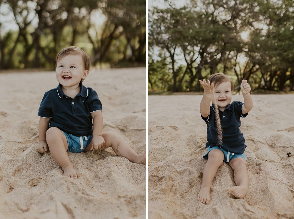Toddler boy sitting on the sand and playing with it
